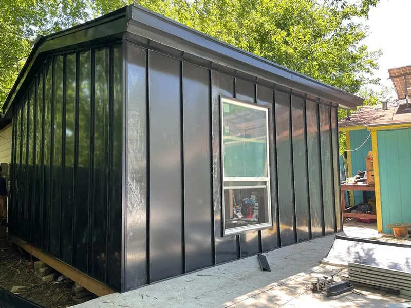 Black standing seam metal wall panels for Roof Inspection in Brewton