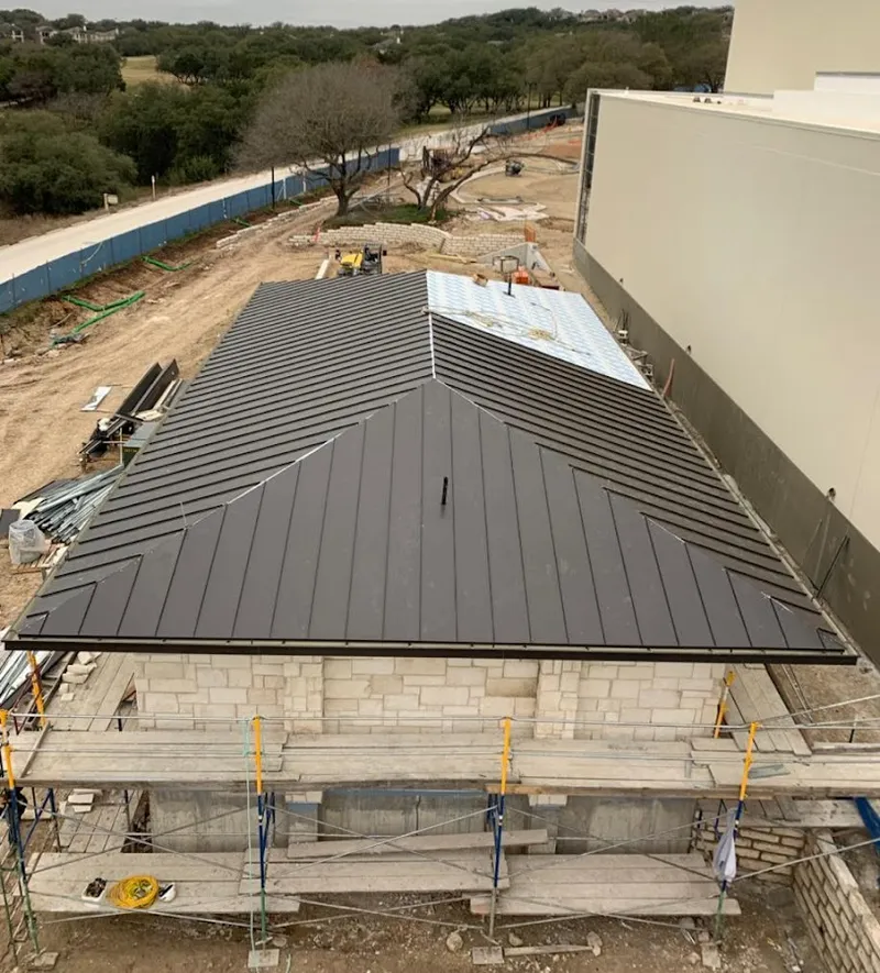 Metal roof new construction with scaffolding in Brewton